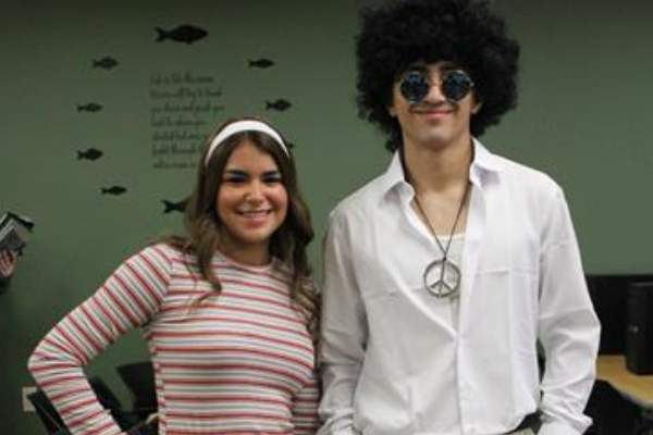 Dani and Joseph look groovy in their threads. 